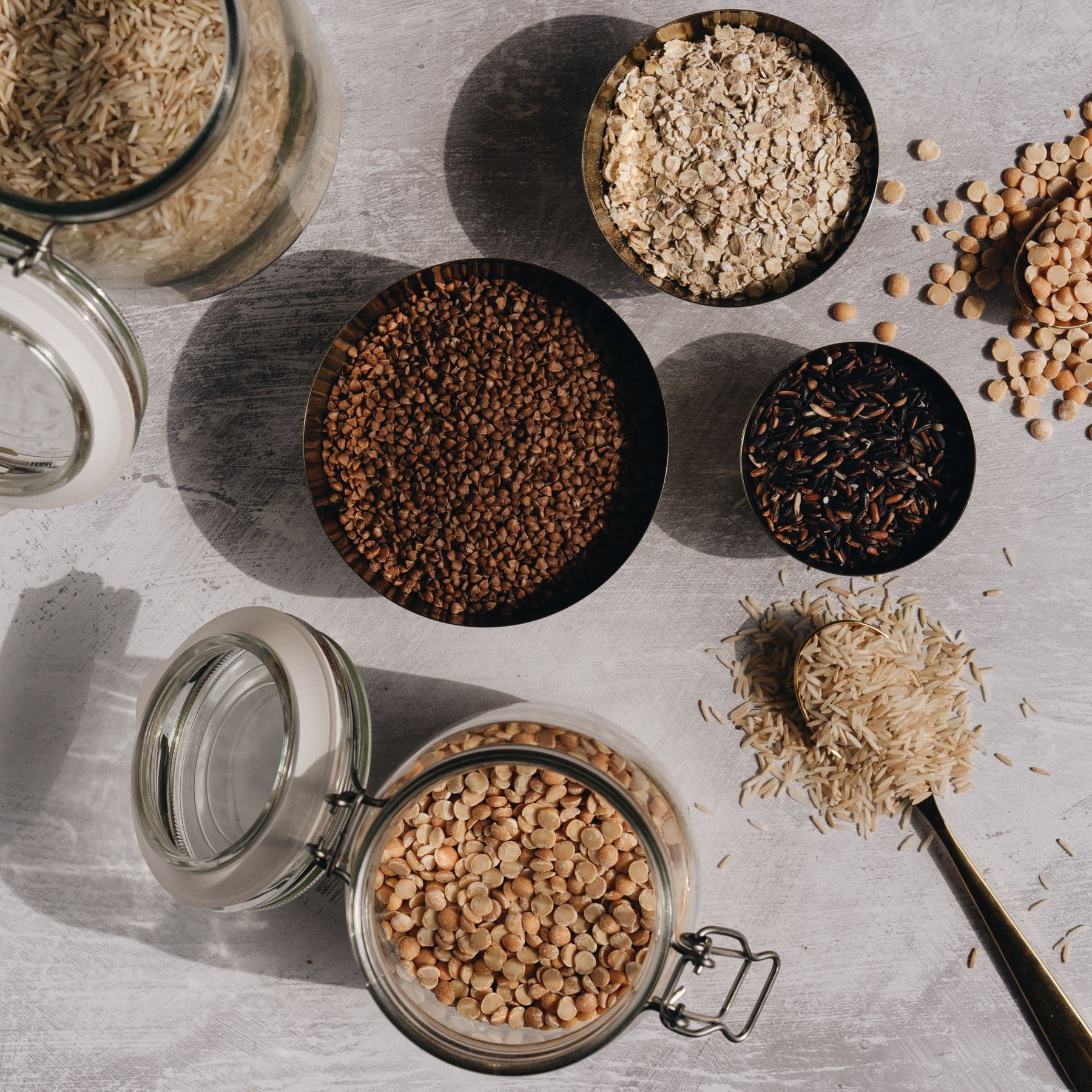 Jars and bowls of rice, grains and pulses