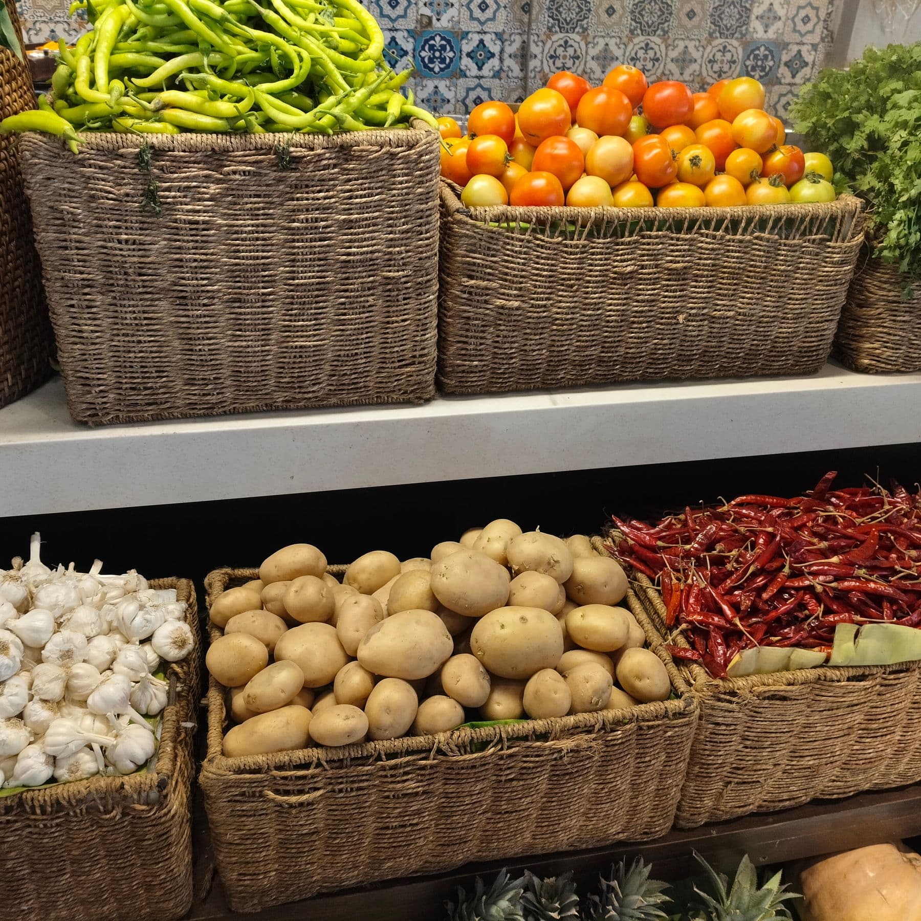 Fresh vegetables arranged in a basket